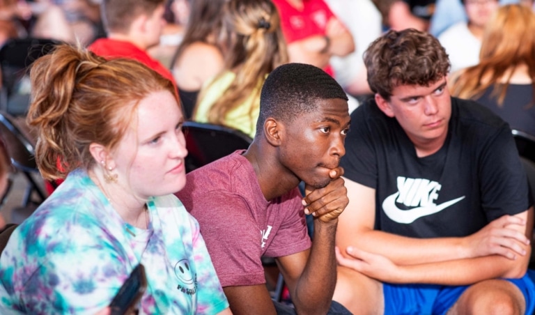 Group of students seated and listening