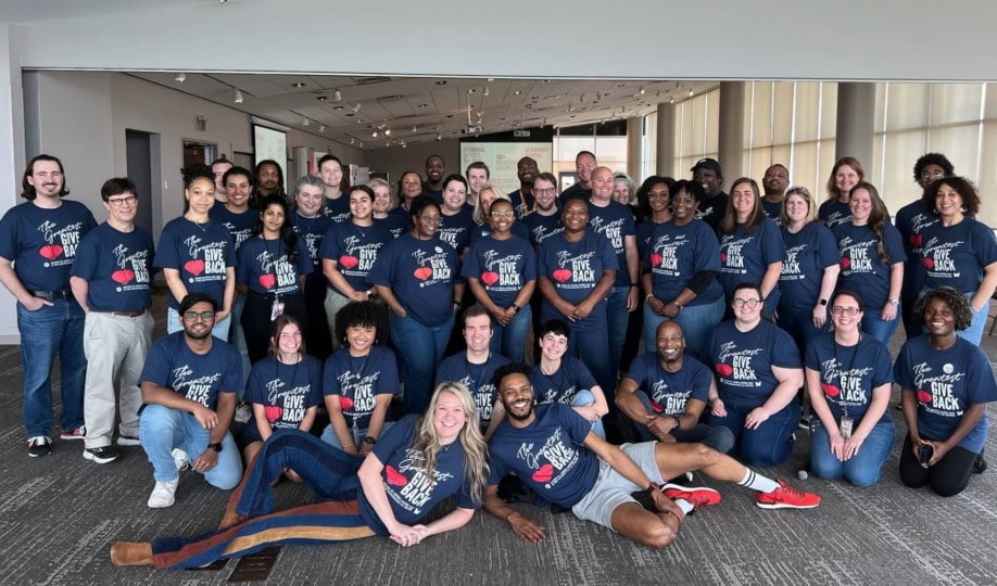 Picture with Muhammad Ali Center and Metro United Way staff posing for picture